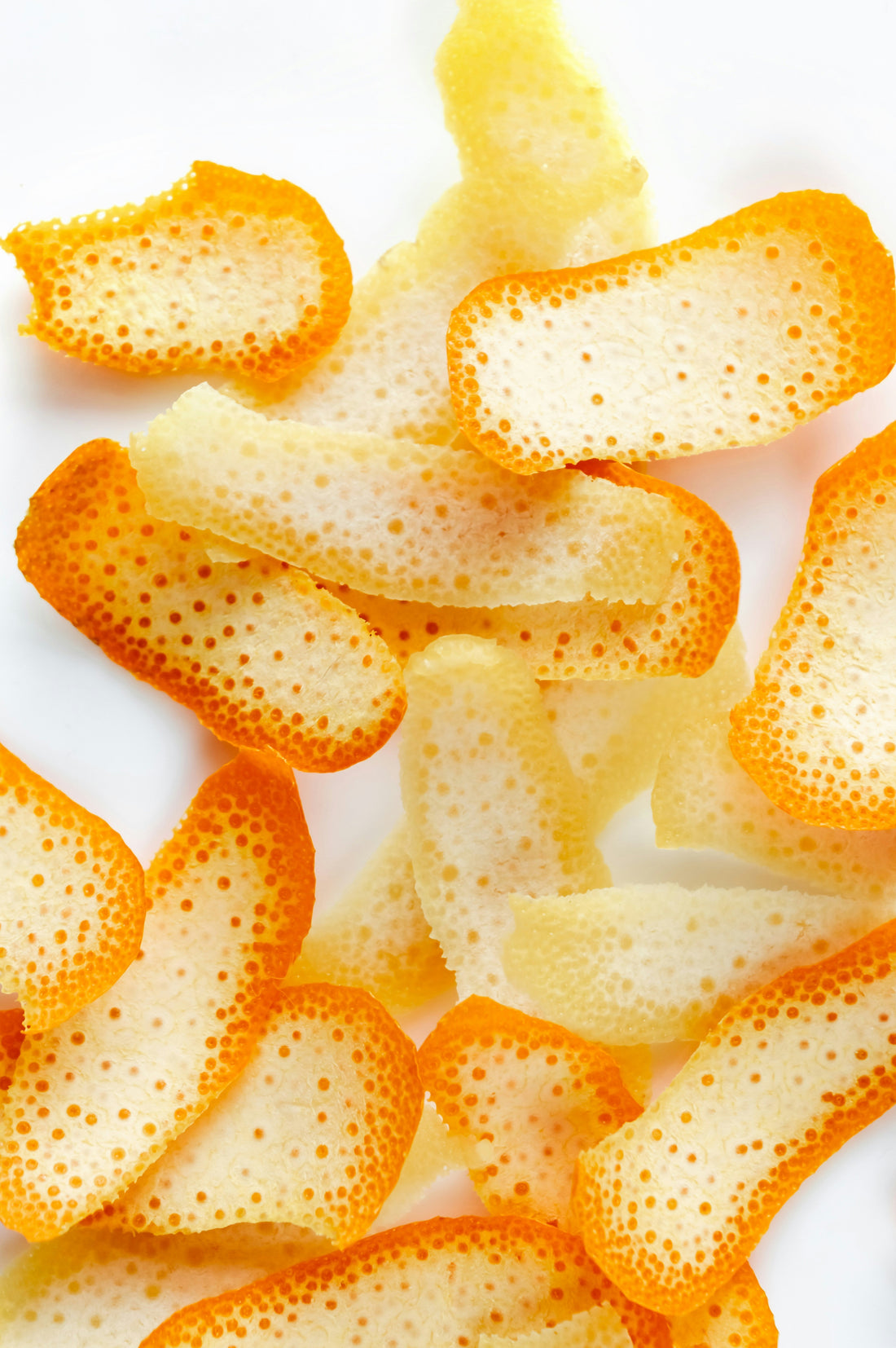 Fresh orange peels showing the natural source of d-Limonene citrus solvent used in eco-friendly cleaning products